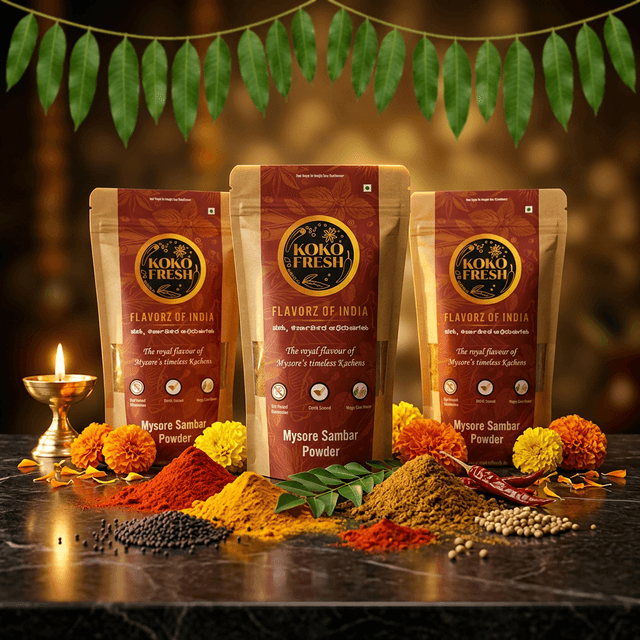 KokoFresh Ugadi masala packages — Mysore Sambar Powder, Bisibelebath Powder with marigold flowers and diya